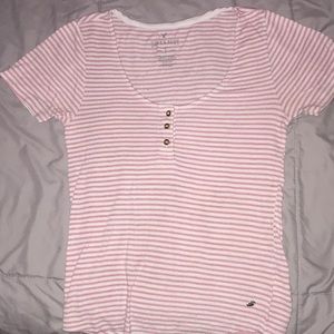 An American Eagle pink stripped shirt
